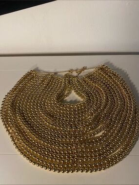 Vintage Gold-Toned Multi-Strand Beaded BIB Necklace Faux Australian Coins Charms